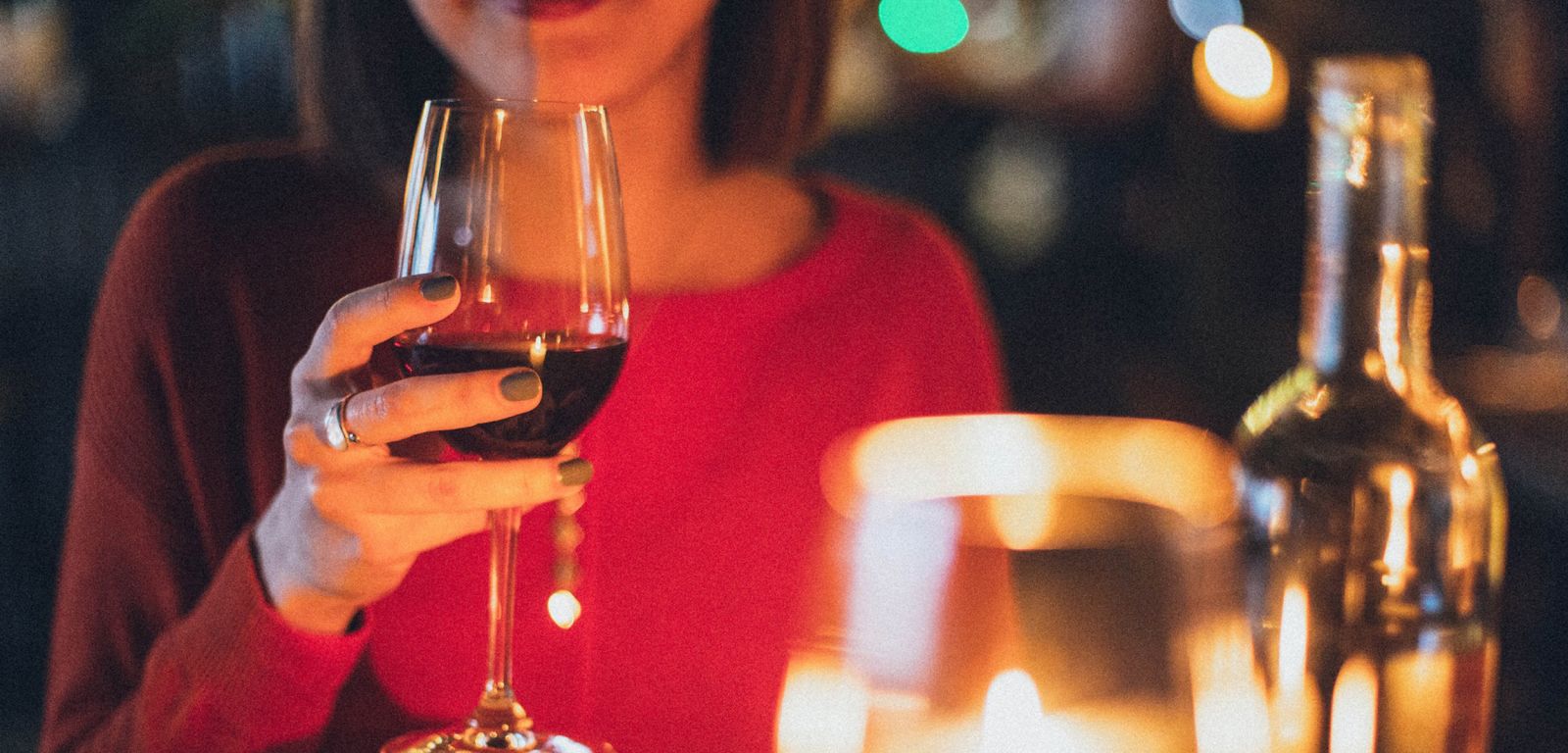 Woman holding a glass of wine