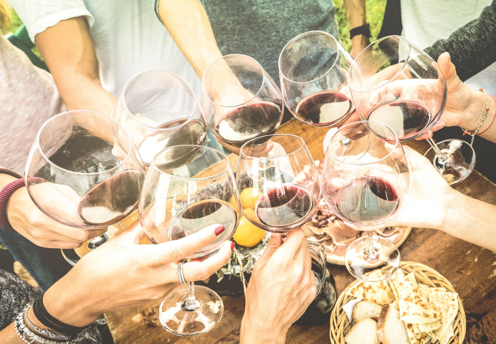 A group of friends toasting wine