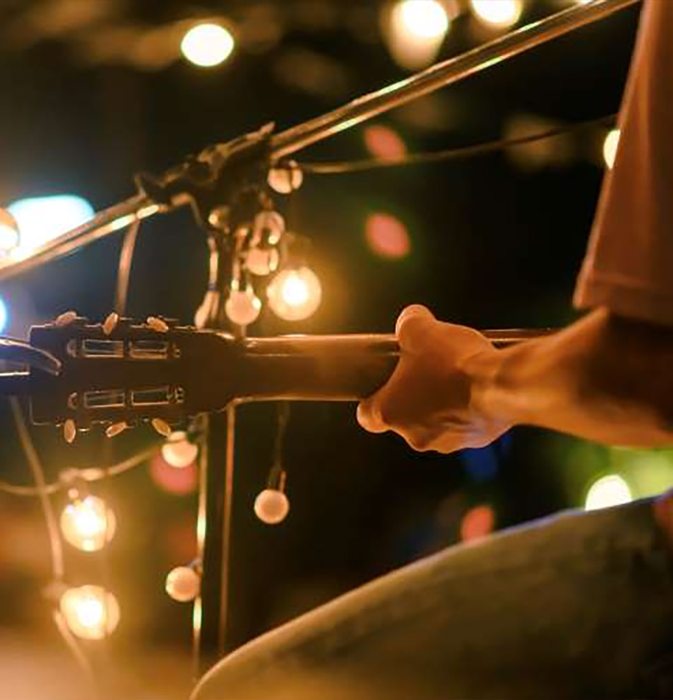 Musician playing a guitar